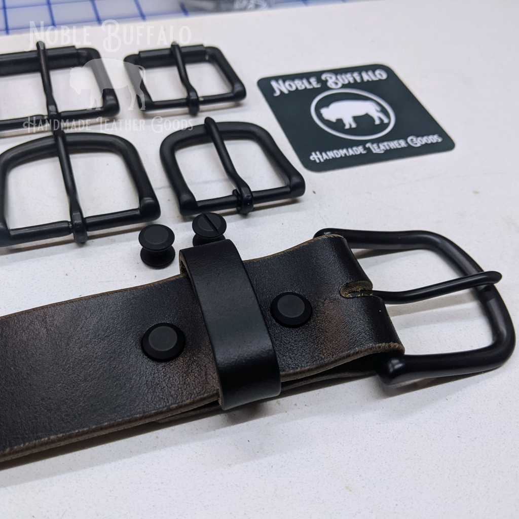 All black leather belt. Black buckle, black screws, and black horween leather strap. Made in the USA all black leather belt.