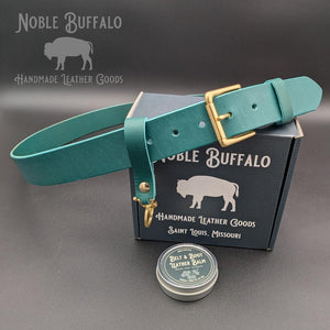 Agave teal full grain leather belt handmade in the USA by Noble Buffalo. Blue-green leather belt in agave teal and deep teal tones. Unisex colorful statement leather belt.