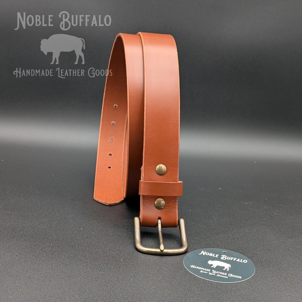 Rich cognac brown leather belt handmade from full grain leather. Warm caramel brown and saddle tan statement belt for men or women. Handmade leather belt USA.