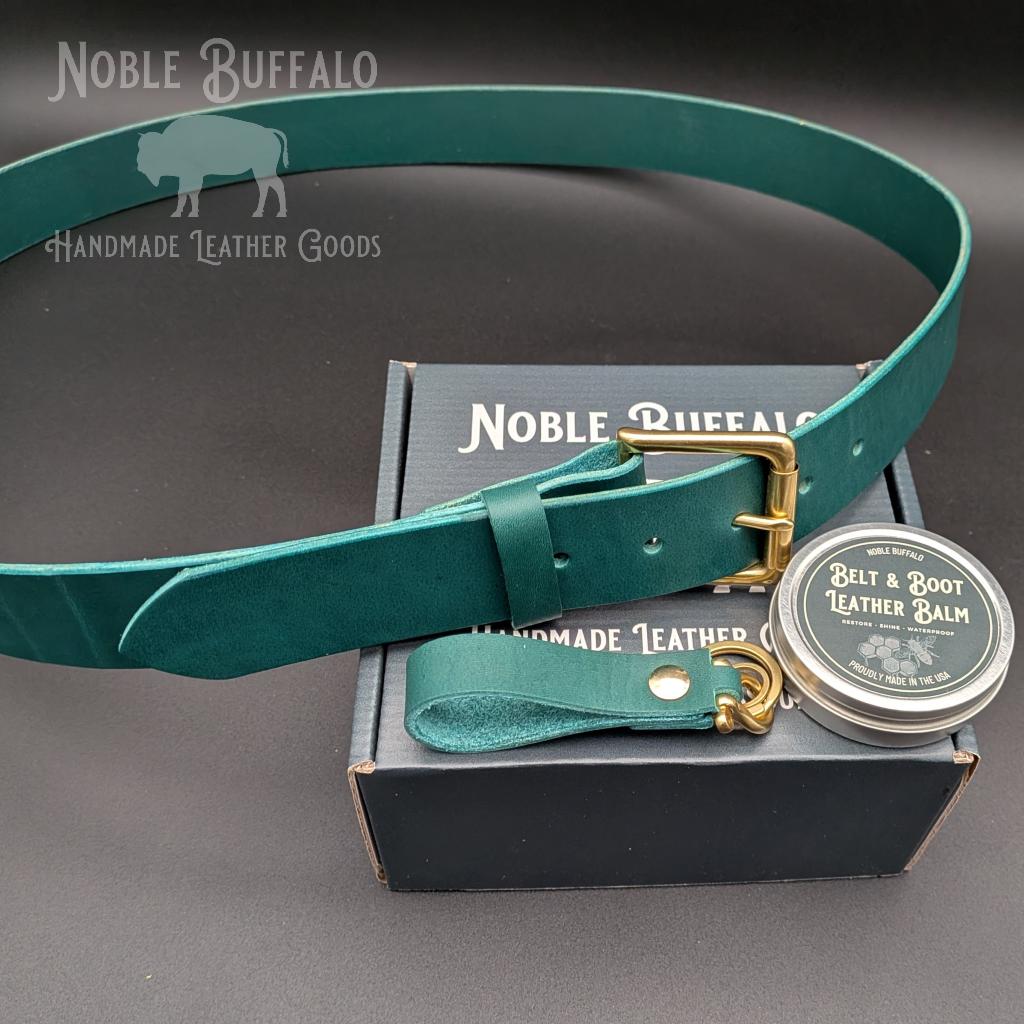 Handmade agave teal leather belt by Noble Buffalo. Rich teal full grain leather belt with blue-green and sea green tones. Colorful unisex leather belt accessory.