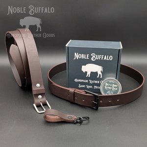 Smoked Walnut full grain leather belt handmade in the USA by Noble Buffalo. Dark brown leather belt with smoked walnut and chocolate brown tones. Unisex classic leather belt.