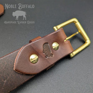 Handmade hickory brown leather belt by Noble Buffalo. Deep dark chocolate full grain leather belt with warm espresso and coffee brown tones. Classic unisex leather belt accessory.